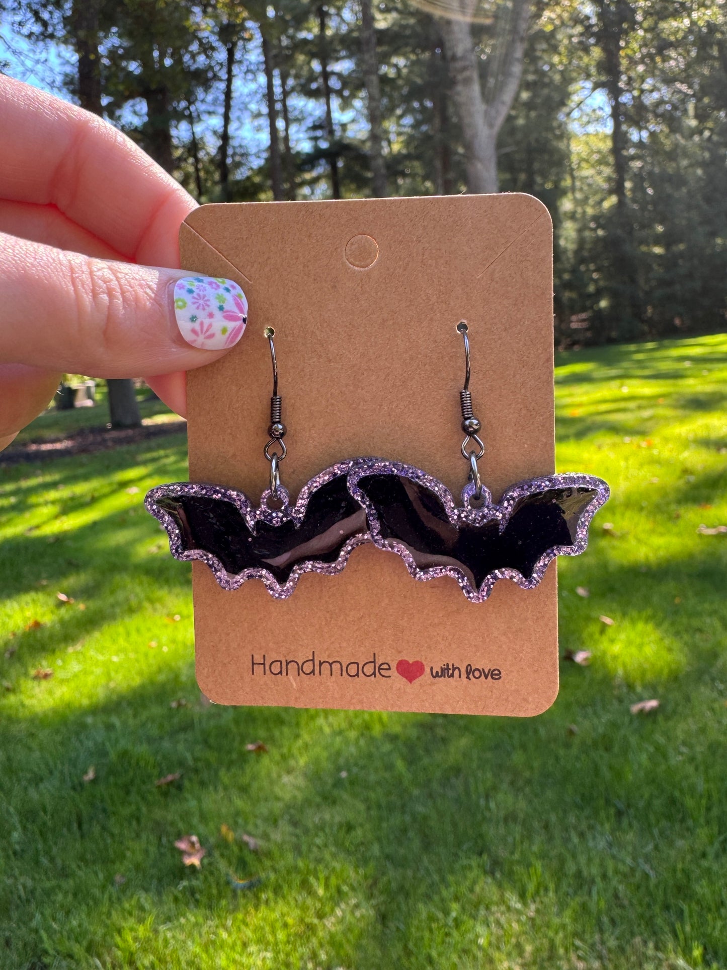 Black Sparkly Bats in Purple Acyrlic Bezel